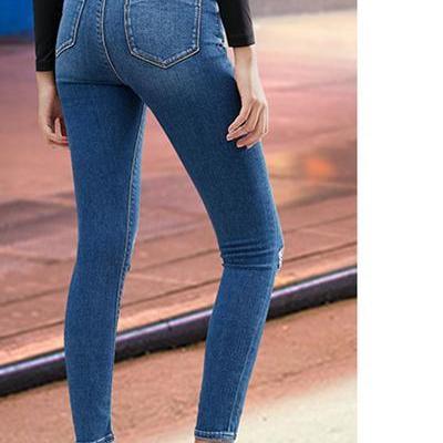 Distressed Medium Washed Regular Rise Skinny Jeans