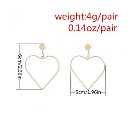 Geometric Exaggeration With Copper Heart Earrings