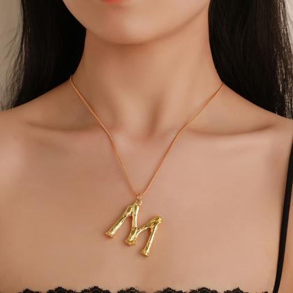 Exaggerated Knuckle Letter Imitation Gold Neck..