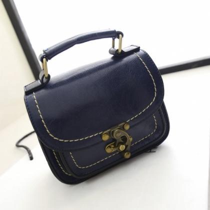 Fashion Women Synthetic Leather Small Flap Handbag..