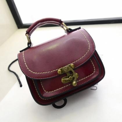 Fashion Women Synthetic Leather Small Flap Handbag..