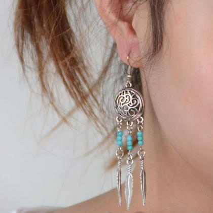 Hollow Out Totem Metal Feathers Tassel Earrings