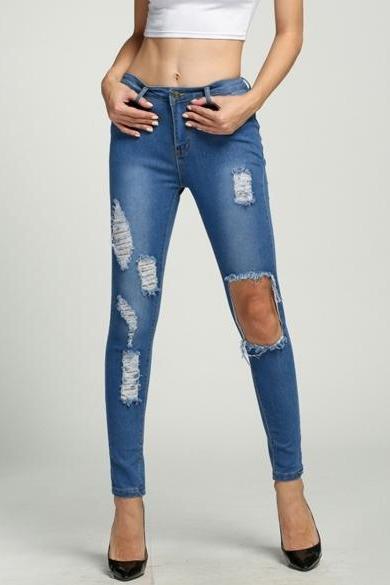 Heavily Distressed And Ripped Knee Hole High Waisted Skinny Jeans